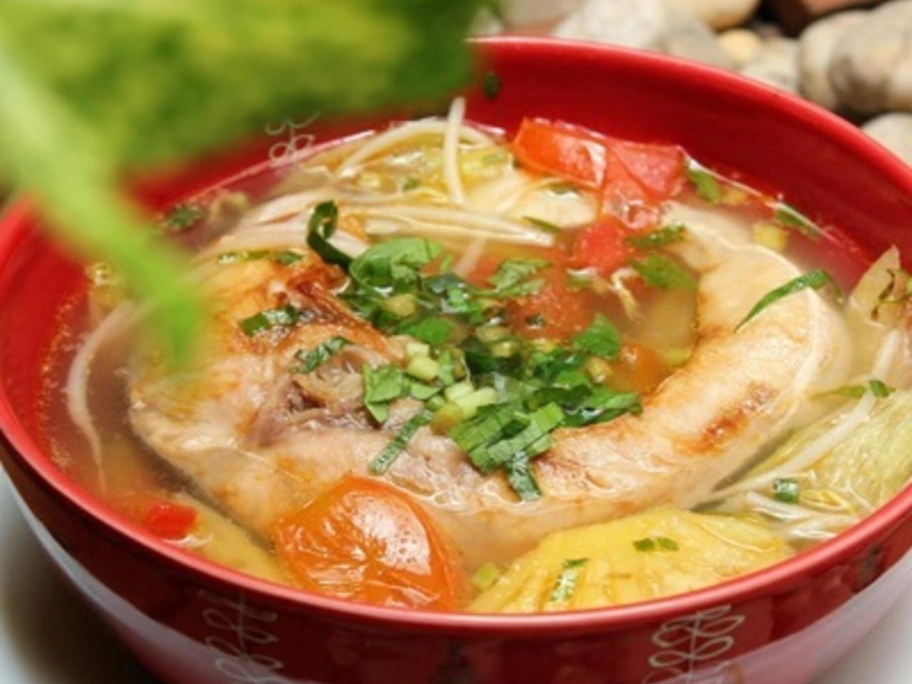 Sweet & sour fish soup always appears in the local people's meal.